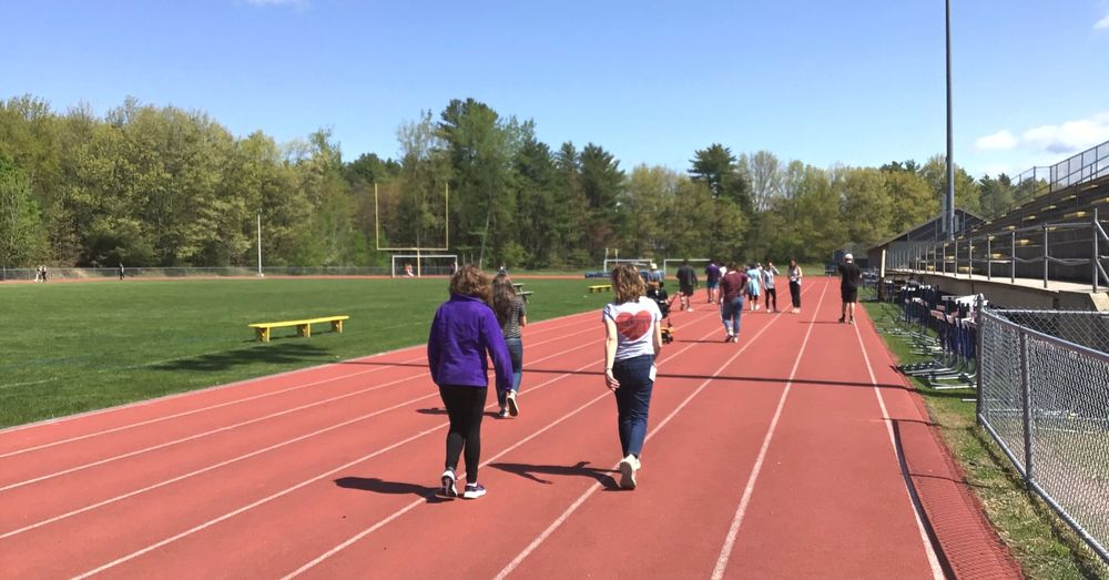students walking on track